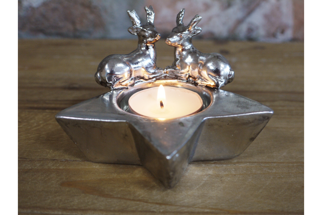 Stag and star shaped candle holder