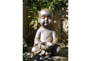 Large Monk ornament holding bowl