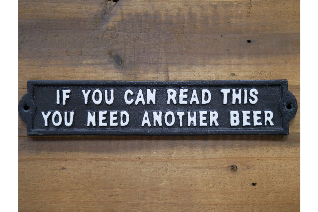 Cast iron sign “if you can read this you need another Beer”