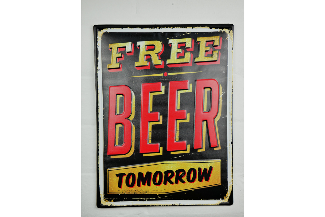 Free beer tomorrow hanging metal sign