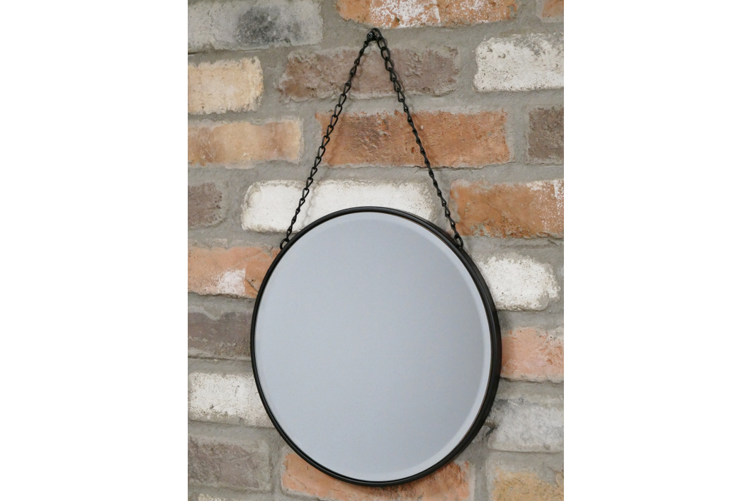 Circular black mirror with hanging chain