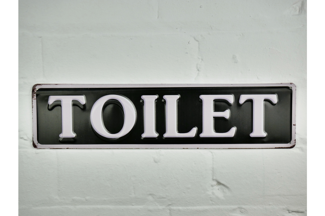 Toilet Sign - black background with white writing